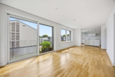 Exklusives Wohnen: 3-Zimmer-Penthouse & 1-Zimmer-Appartement mit besonderem Flair - Wohnzimmer