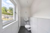 Kernsanierte 3-Zimmer-Wohnung mit hellen Räumen, Balkon & Gartenterrasse - Gäste WC