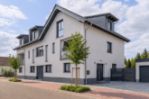 Neuwertige 4-Zimmer-Maisonettewohnung mit Loggia, Garage und modernem Wohnkomfort - Außenansicht