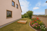 Entkerntes Einfamilienhaus mit Entfaltungspotenzial & eindrucksvollem Fernblick über die Rheinebene - Staging: Garten