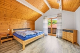 Exklusives Feriendomizil mit 4 Appartements und integriertem Wohnhaus in privilegierter Panoramalage - Schlafzimmer
