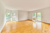 Helle 5-Zimmer-Wohnung im Erdgeschoss mit großzügigen Terrassen und modernem Wohnkomfort - Wohnzimmer