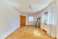 Wohnträume mit Perspektive – freistehendes Einfamilienhaus mit zusätzlichem Bauplatz - Wohnzimmer