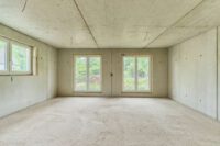 Modernes Wohnen nach Ihren Vorstellungen – Ausbauhaus mit 2 Maisonettewohnungen - Wohnzimmer UG