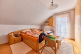 Einfamilienhaus mit idyllischem Garten - Schlafzimmer