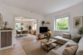 Wohnen zwischen Weinreben: Doppelhaushälfte mit Garten, Garage und Ausbaureserve - Wohnzimmer