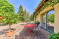 Wohnensemble mit Dreiseithof-Charakter, Wintergarten & mediterranem Flair - Innenhof