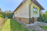 Einfamilienhaus mit besonderem Ambiente und grünem Rückzugsort - Außenansicht