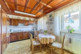 Einfamilienhaus mit besonderem Ambiente und grünem Rückzugsort - Küche