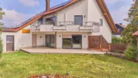 Ein Zuhause zum Ankommen: Familienidylle mit grünem Gartenparadies und Einliegerwohnung - Garten