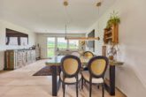 Ein Logenplatz über den Weinbergen: Moderne Souterrainwohnung mit traumhaftem Ausblick - Esszimmer