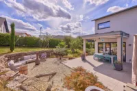 Wohnen mit grenzenlosem Raumgefühl – exklusives Architektenhaus in traumhafter Lage - Terrasse Ost