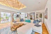 Wohnen mit grenzenlosem Raumgefühl – exklusives Architektenhaus in traumhafter Lage - Wohnzimmer