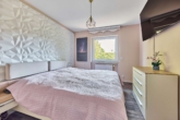 Exklusiver Bungalow in ruhiger Lage mit lichtdurchfluteten Räumen - Schlafzimmer