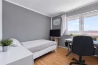 Gepflegtes Mehrfamilienhaus mit zuverlässigen Einnahmen & steigender Renditechance - Gästezimmer - digitales staging