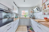 Helle & moderne 4-Zimmer Maisonettewohnung mit Balkon, PV-Anlage & Garage in optimaler Lage - Küche
