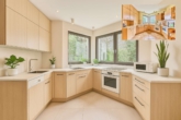 Licht. Luft. Lebensqualität – Architektenhaus mit Einliegerwohnung und besonderem Flair - Küche