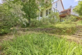 Licht. Luft. Lebensqualität – Architektenhaus mit Einliegerwohnung und besonderem Flair - Gartenansicht