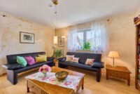 Gartenidylle trifft Wohnqualität – ein Zuhause zum Wohlfühlen - Wohnzimmer