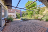 Gemütliches Einfamilienhaus mit Einliegerwohnung, großzügiger Außenanlage & Sauna - Terrasse