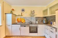 Bungalow mit besonderem Wohngefühl und großzügiger Sonnenterrasse - Küche
