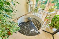 Bungalow mit besonderem Wohngefühl und großzügiger Sonnenterrasse - Wendeltreppe