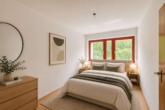 Gepflegte & helle 2-Zimmer-Wohnung mit eigenem Garten & Terrasse in Waldrandlage - Schlafzimmer - digitales staging