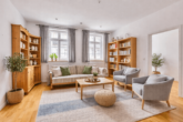 Historisches Gebäude mit 2 Wohnungen und Geschäftsfläche im Herzen der Stadt - Wohnzimmer_digitales staging
