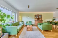 Winkelbungalow mit Einliegerwohnung-Potenzial und traumhaften Außenbereich - Wohnzimmer