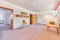 Charakterstarkes Split-Level-Haus mit Einliegerwohnungspotenzial im Untergeschoss - Zimmer Untergeschoss