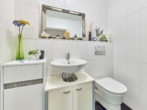 Einziehen & Wohlfühlen: Edle 3,5-Zimmer-Erdgeschosswohnung mit eigenem Garten in Feldrandlage - Gäste-WC