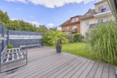 Einziehen & Wohlfühlen: Edle 3,5-Zimmer-Erdgeschosswohnung mit eigenem Garten in Feldrandlage - Terrasse / Garten