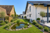 Einziehen und wohlfühlen - Einfamilienhaus mit Garten und durchdachtem Wohnkomfort - Garten_digitales Staging