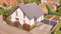 Einziehen und wohlfühlen - Einfamilienhaus mit Garten und durchdachtem Wohnkomfort - Außenansicht