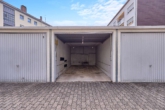 Stilvoll renovierte 4-Zimmer-Wohnung mit hochwertiger Einbauküche und hellem Wohnambiente - Garage