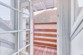 Sonnenparadies: Lichtdurchflutete Dachgeschosswohnung im modernisierten Fachwerkhaus - Austritt