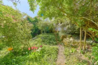 Stadtnah wohnen, naturnah leben - Doppelhaushälfte mit Wintergarten und wunderschönem Grundstück - Garten