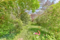 Stadtnah wohnen, naturnah leben - Doppelhaushälfte mit Wintergarten und wunderschönem Grundstück - Garten