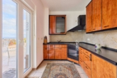 Lichtdurchflutete Eigentumswohnung im Penthouse-Charakter mit einzigartigem Fernblick - Küche