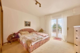 Lichtdurchflutete Eigentumswohnung im Penthouse-Charakter mit einzigartigem Fernblick - Schlafzimmer