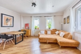 Modernisiertes Wohnhaus mit großzügiger Raumaufteilung in beliebter Lage - Wohnzimmer