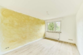 Renovierte 4-Zimmer-Wohnung mit Balkon und Garage - Zimmer