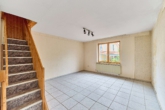 Vielseitiges Einfamilienhaus mit flexiblen Aufteilungsmöglichkeiten & besonderer Dachterrasse - Wohnzimmer