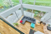 Elegant & Klar: Modernes Einfamilienhaus mit luxuriöser Ausstattung in einzigartiger Feldrandlage - Wohnzimmer